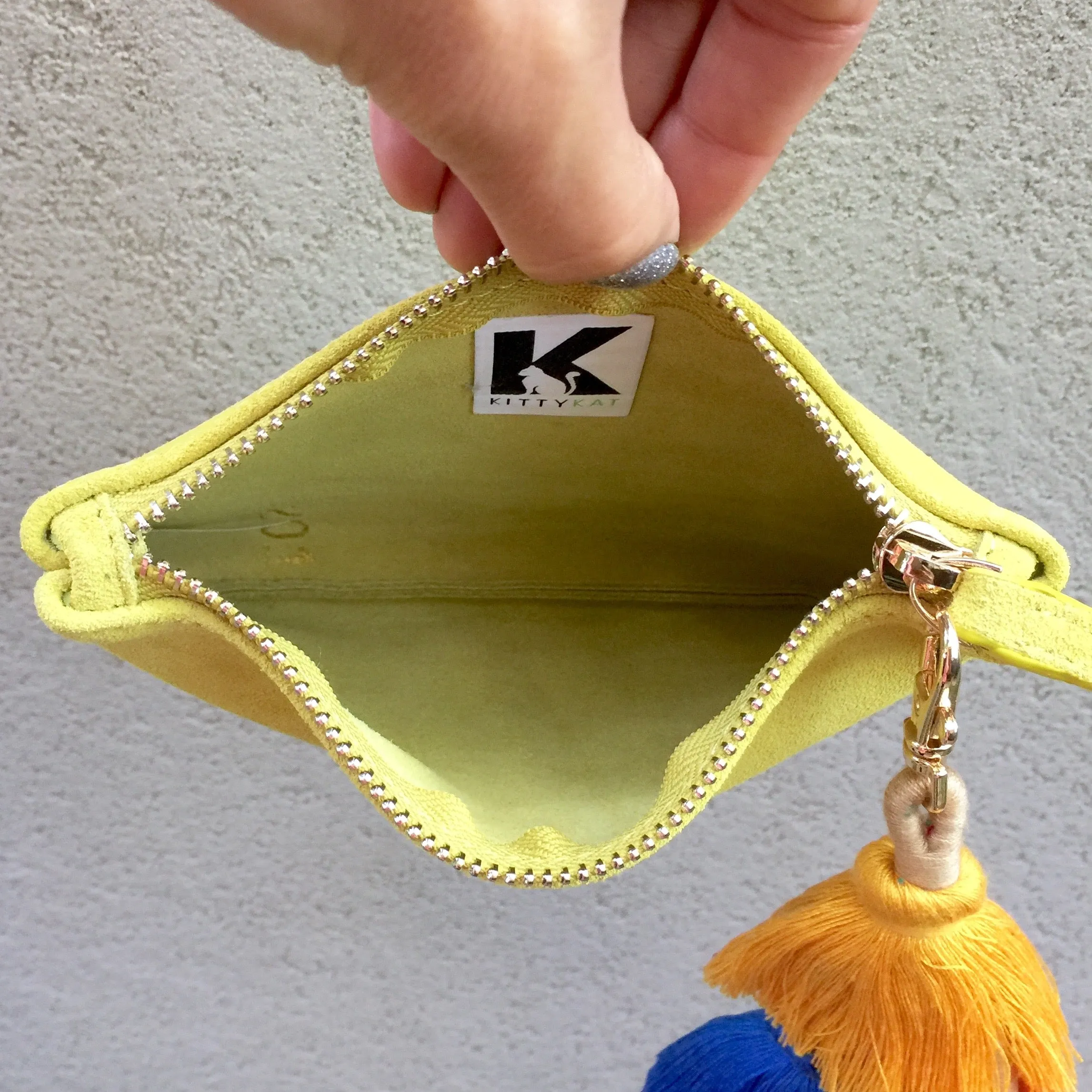Barcelona Suede Clutch Pouch With Detachable Pom Pom Tassel