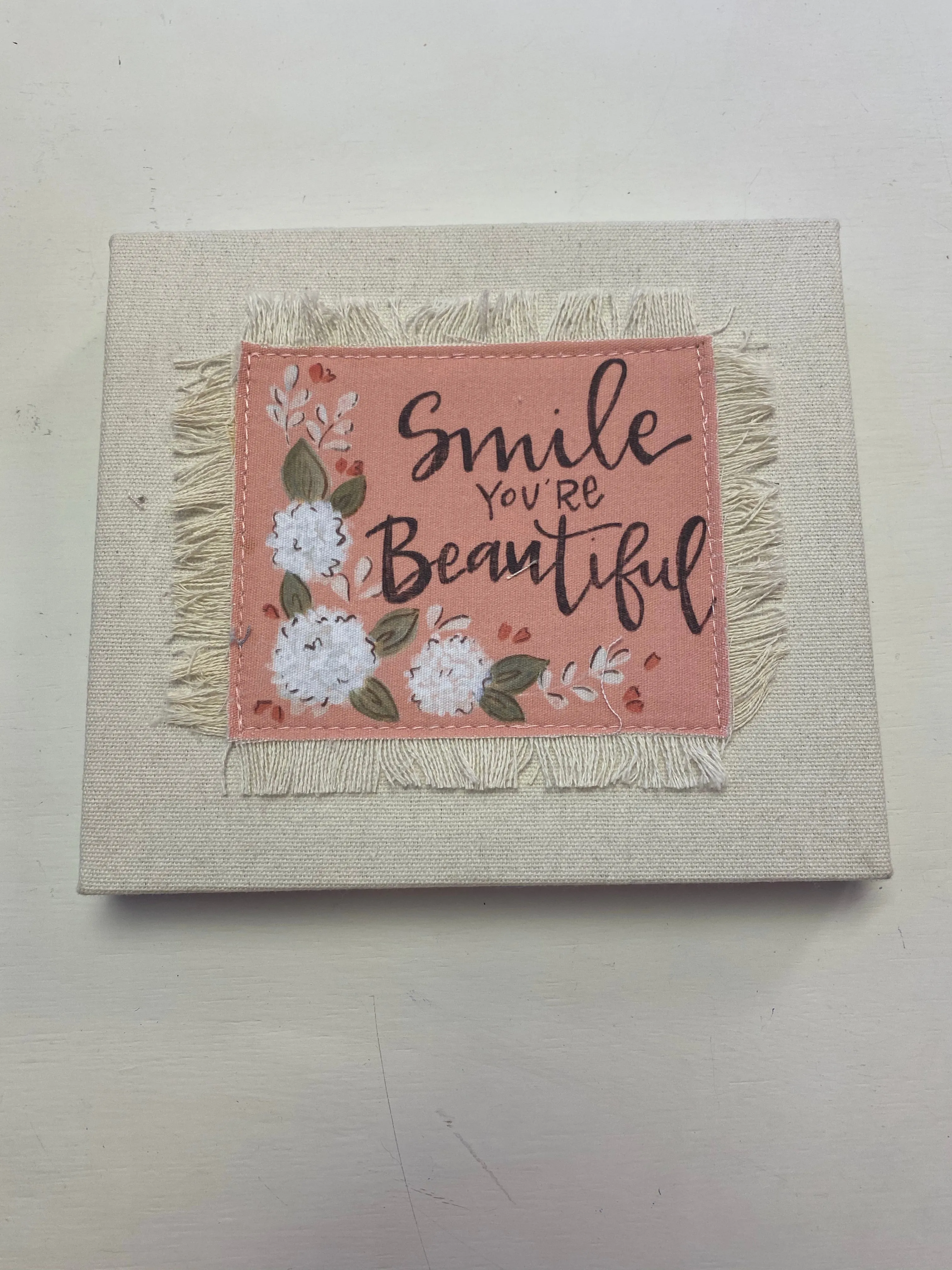Frayed Canvas Sign