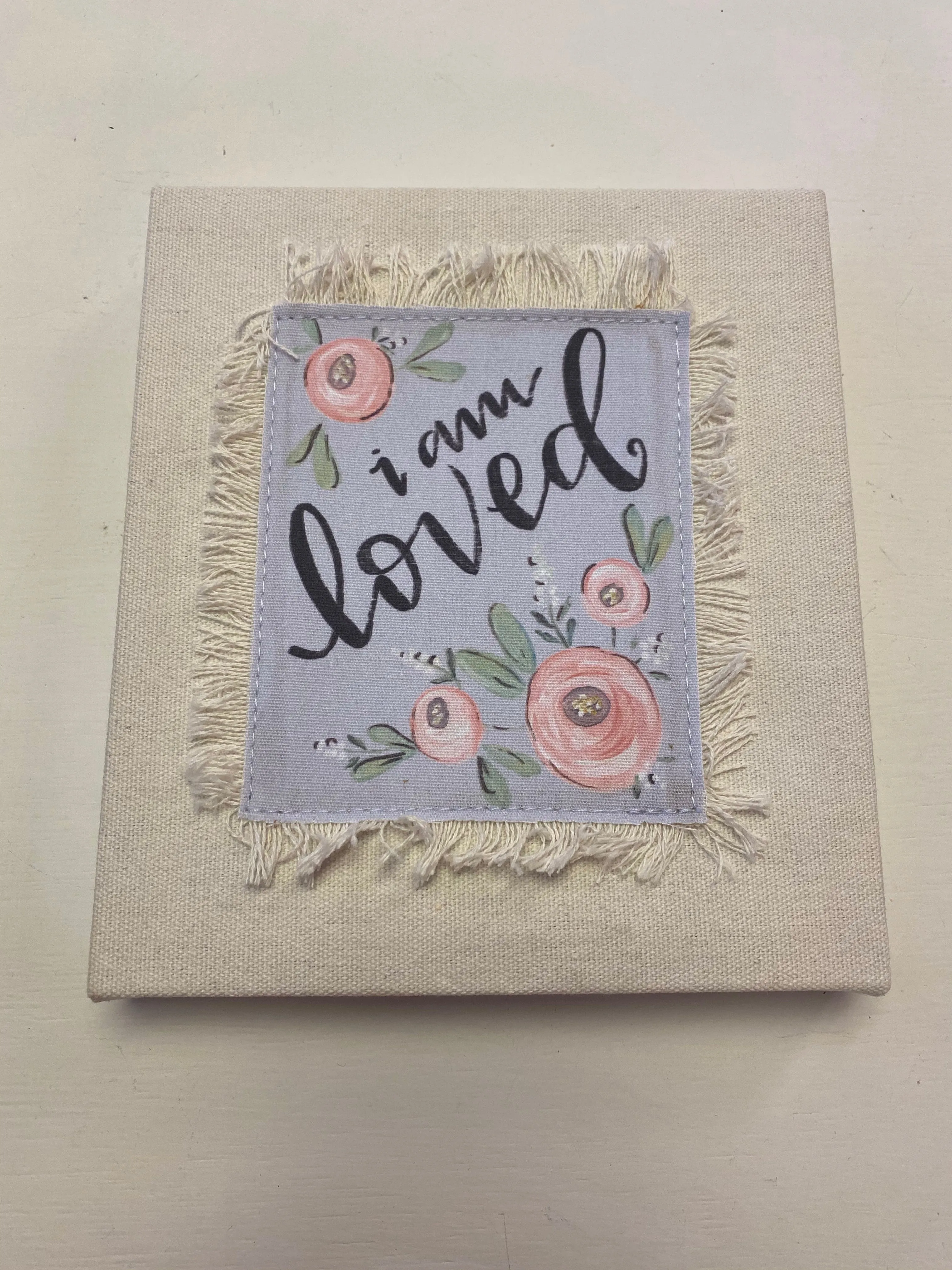 Frayed Canvas Sign