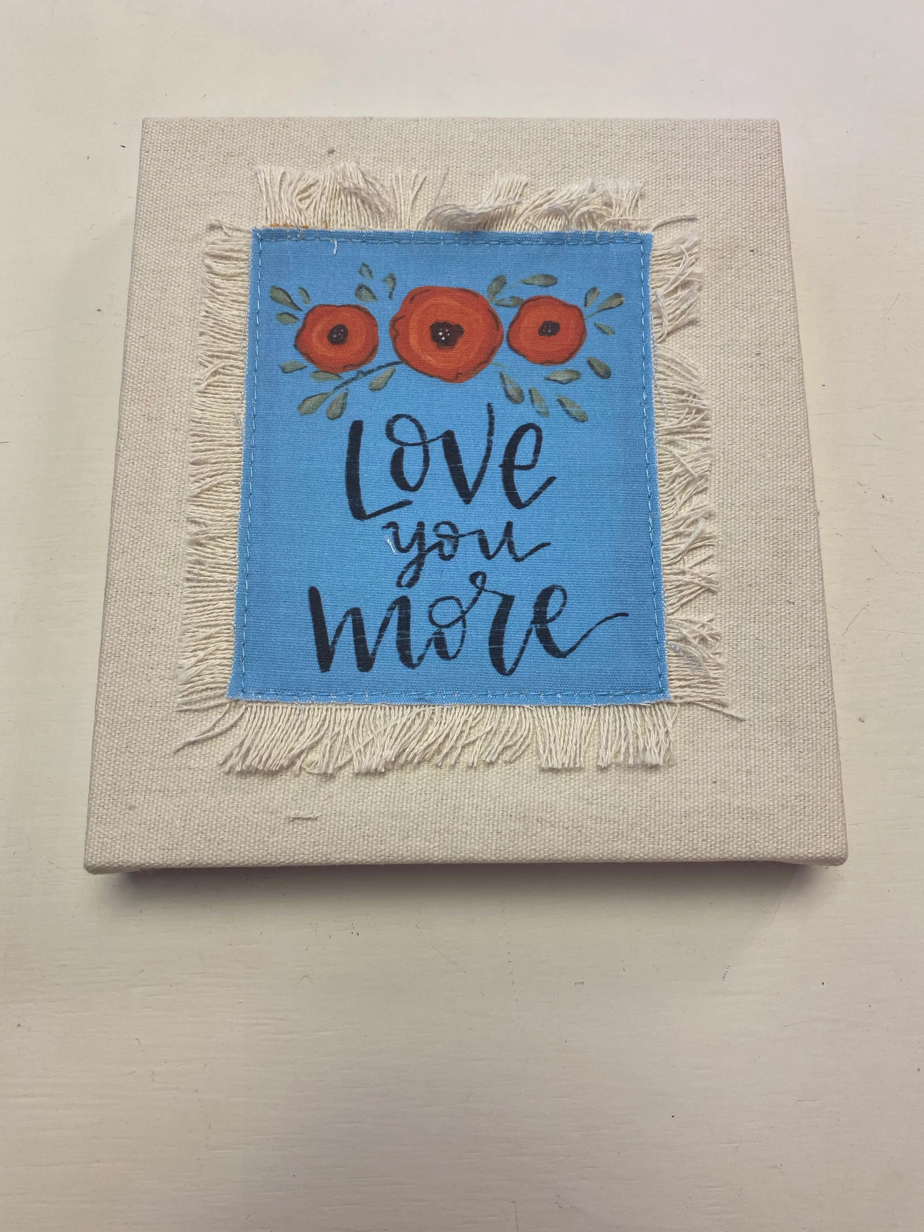 Frayed Canvas Sign