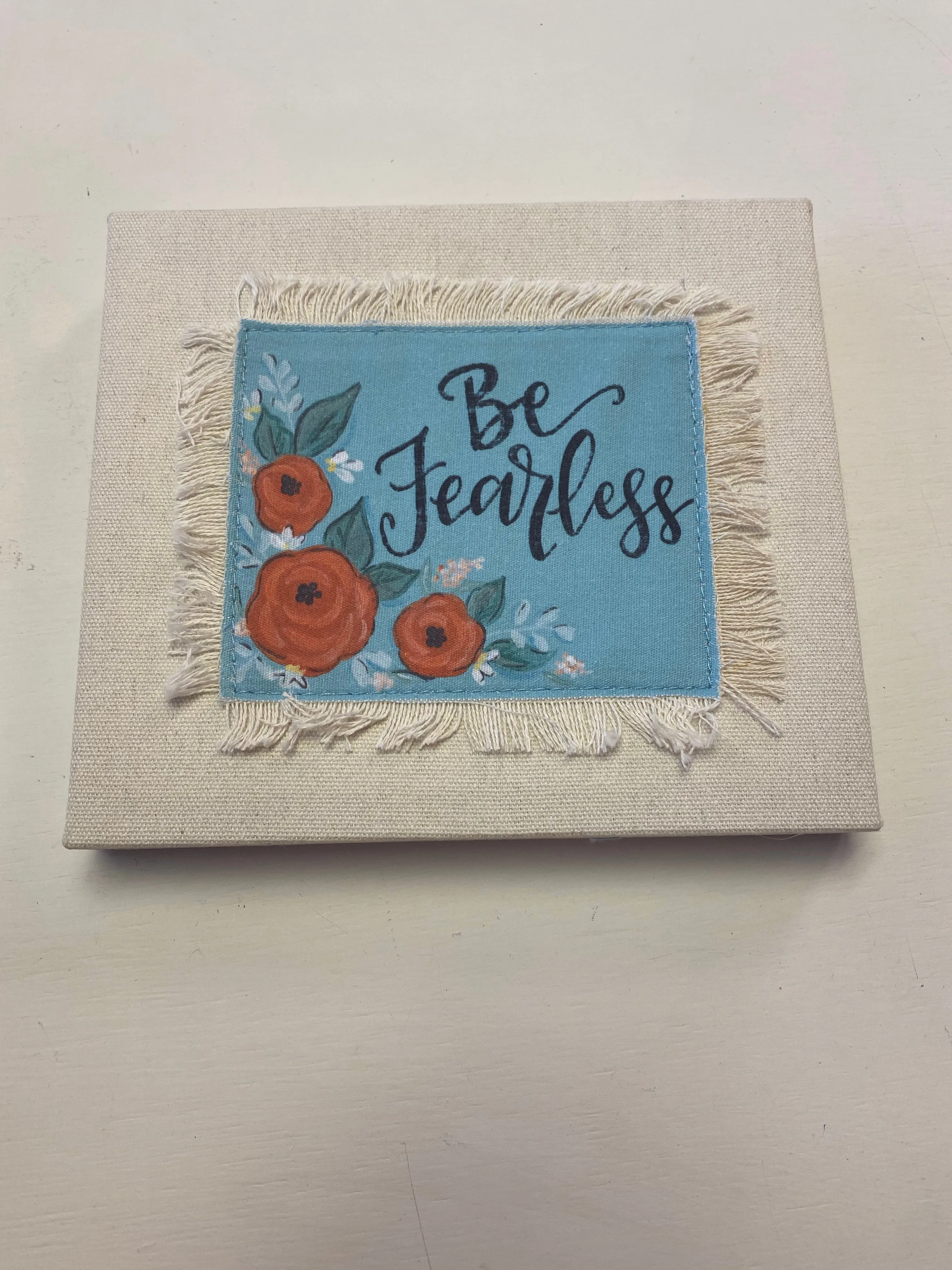 Frayed Canvas Sign